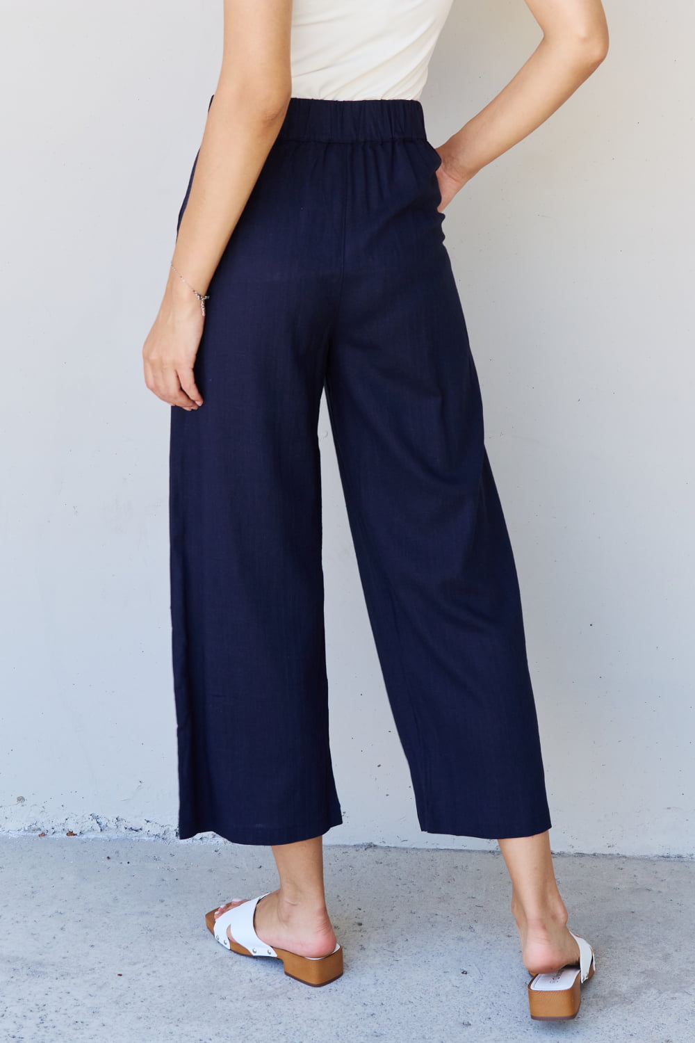 And The Why In The Mix Full Size Pleated Detail Linen Pants in Dark Navy - AllIn Computer
